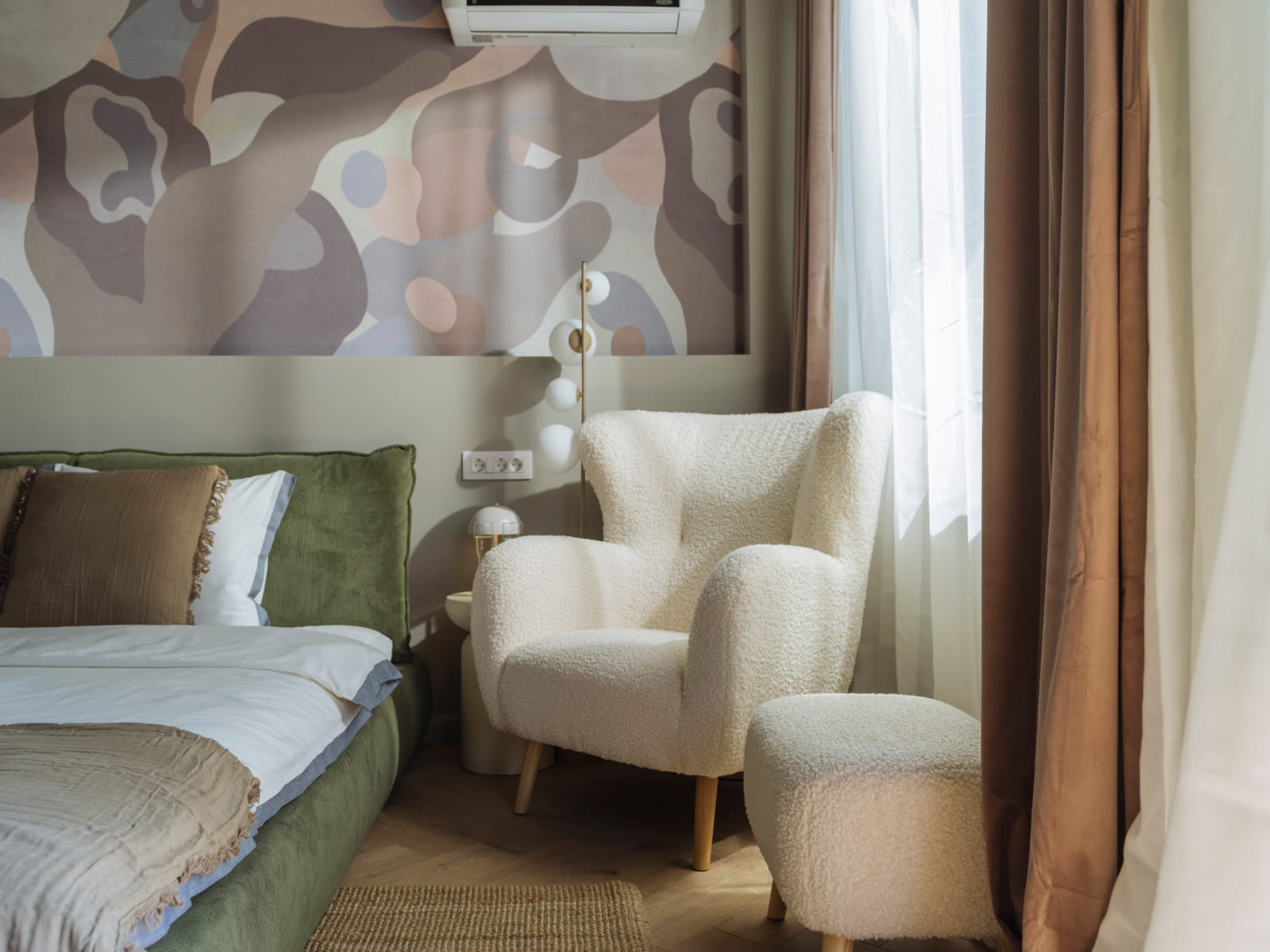 Batistei Olive — Bed and the armchair by the window