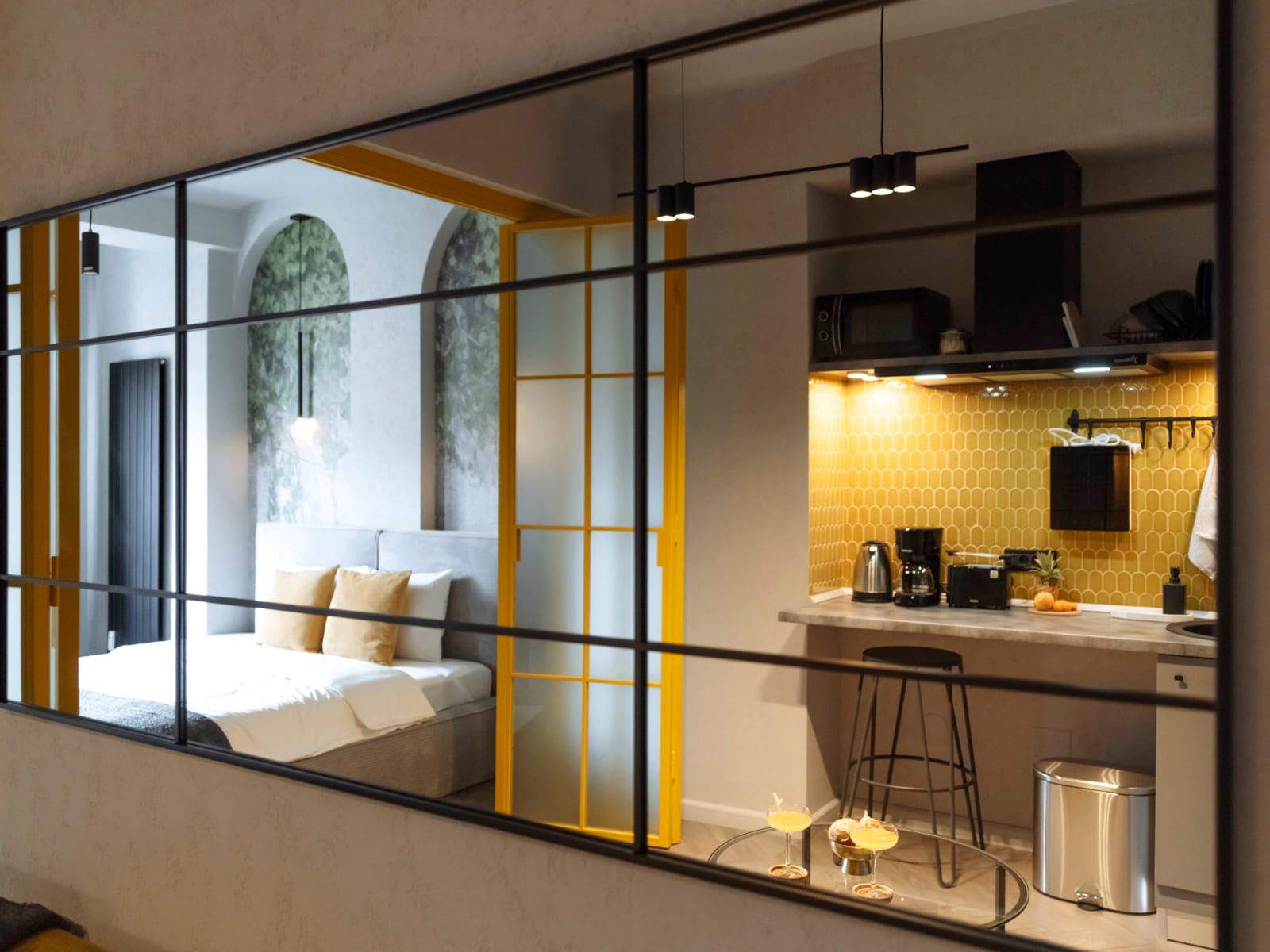 Demeter Studio 87 — The mirror wall and the kitchen