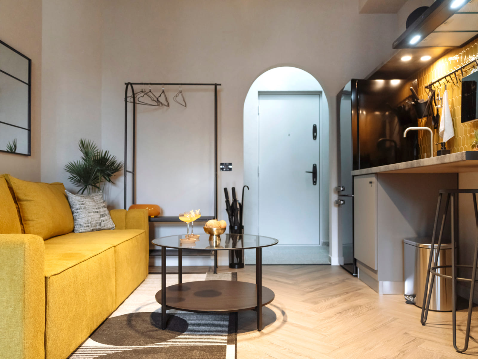 Demeter Studio 87 — Sofa and the entrance arch