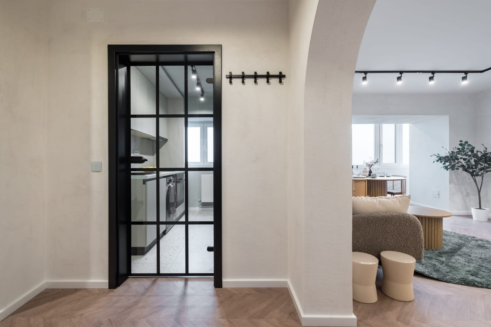 P.A.I Apartment — Steel door, from the living room