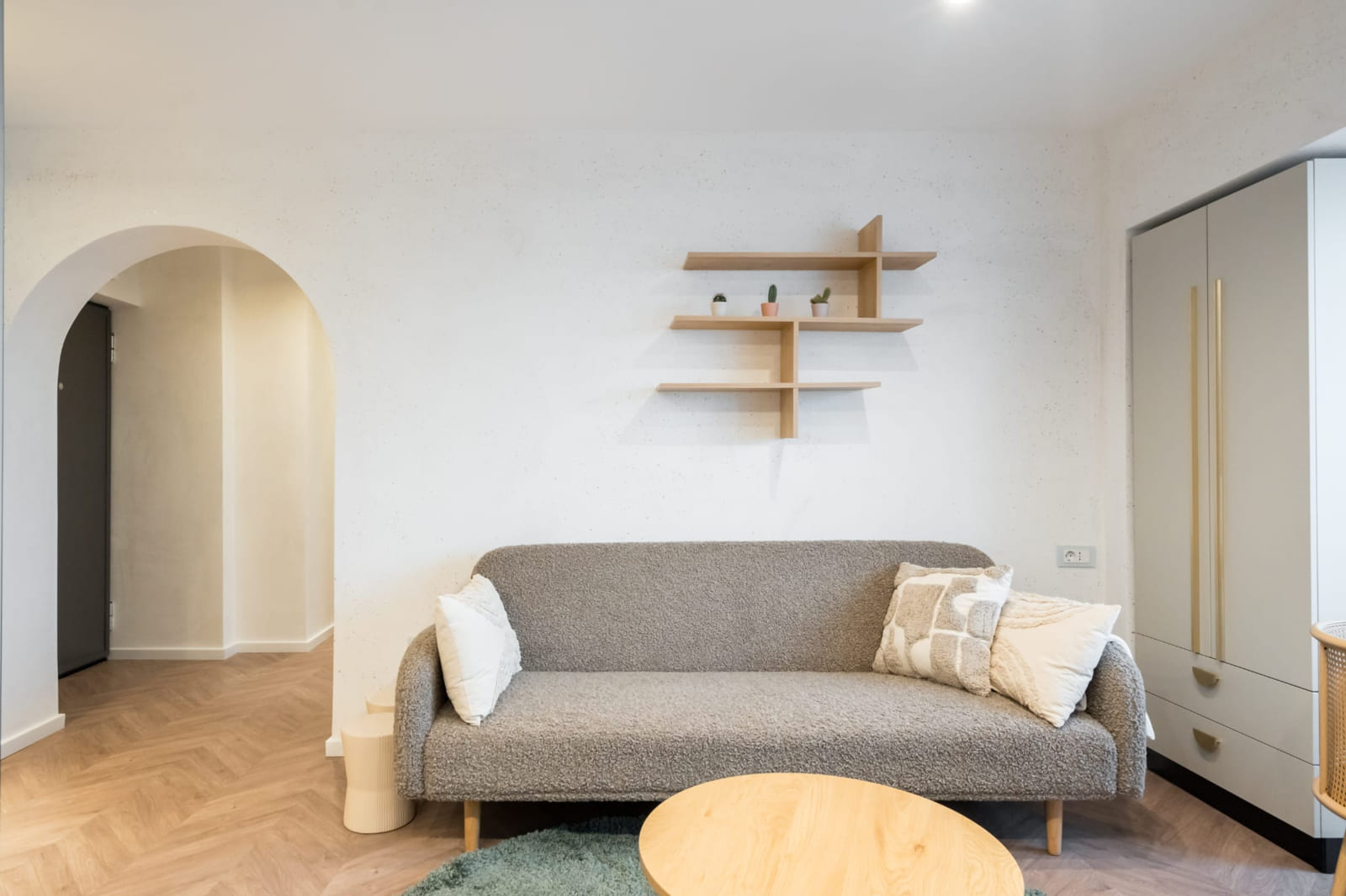 P.A.I Apartment — Sofa and the arch