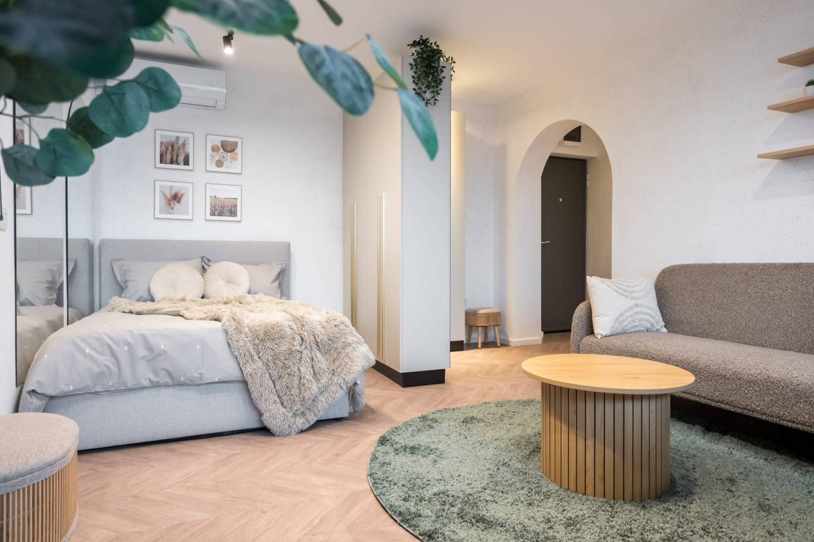 P.A.I Apartment — Bed and the round table