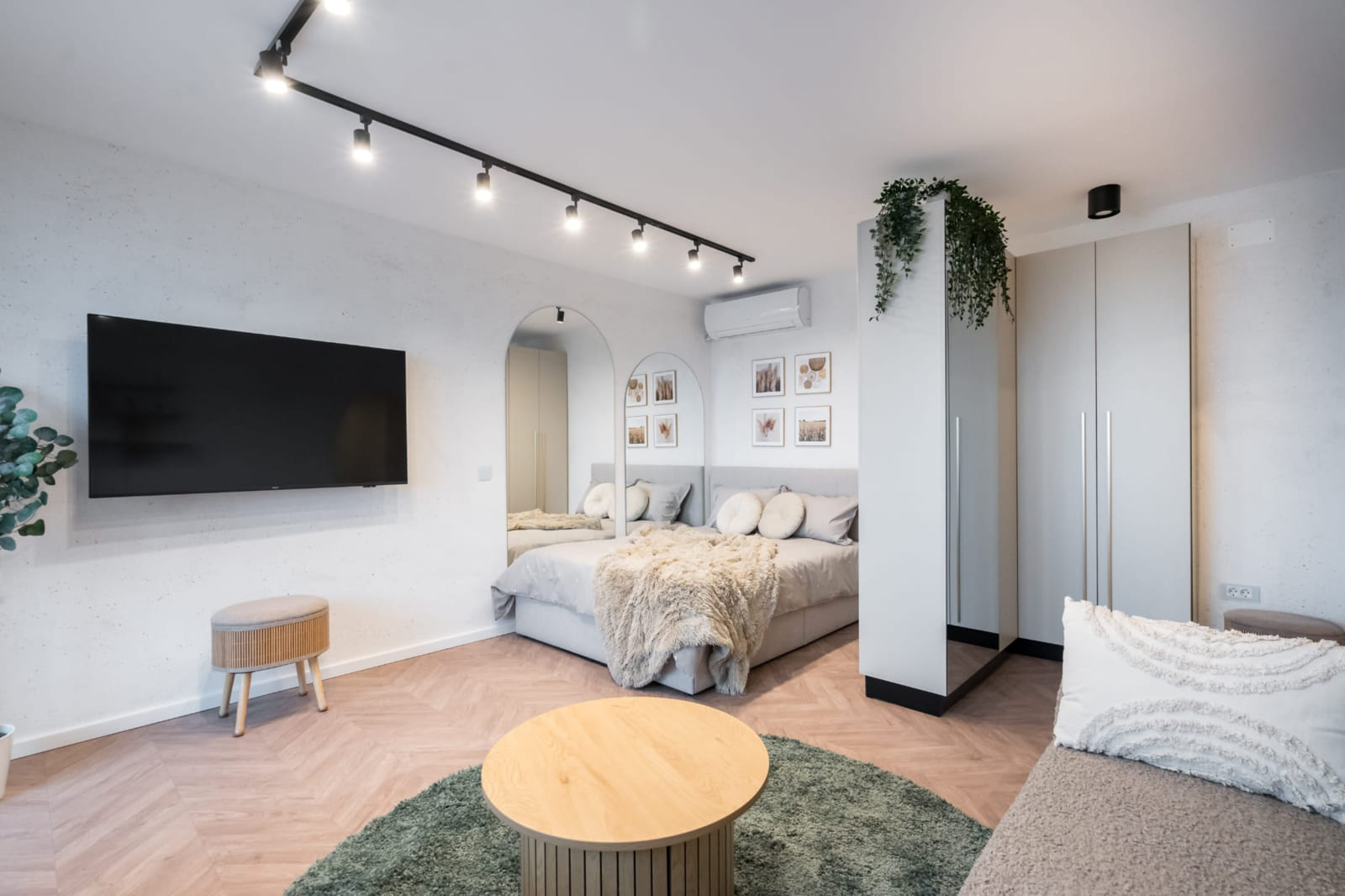 P.A.I Apartment — Bed and the low table
