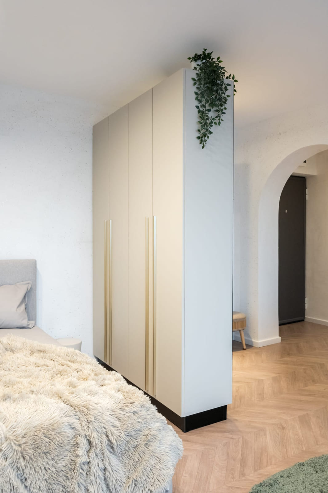 P.A.I Apartment — Wardrobe and the bed