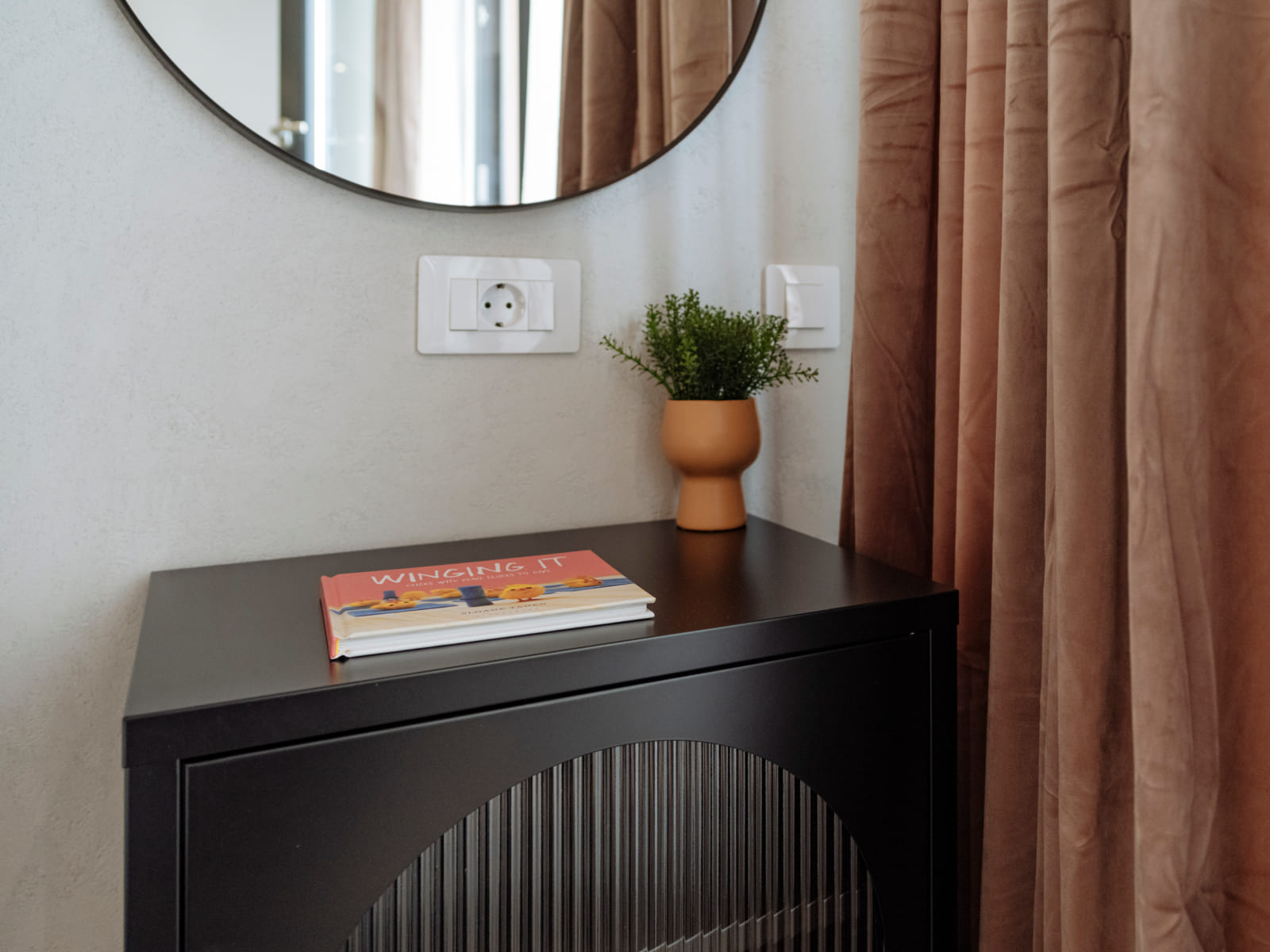 Zalomit Studio 81 — Black cabinet and curtain