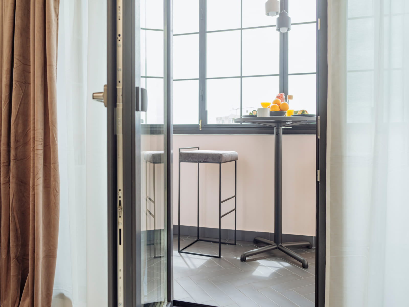 Zalomit Studio 81 — Balcony doors and stool